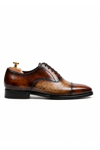 Ambrogio Rovello cap-toe Oxford in hand-painted cognac and cream calfskin leather with closed lacing.