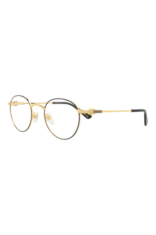 Gucci round metal eyeglasses in shiny yellow gold with black rims and signature stripe detail on the temples.