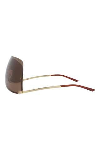 Gucci GG1560 S unisex shield sunglasses in shiny gold metal with brown wrap lenses and slim gold temples.