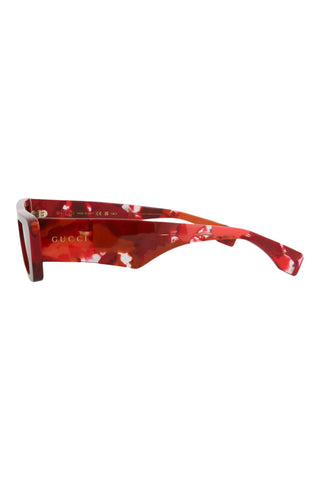 Gucci GG1625S men's square sunglasses in shiny red and burgundy Havana recycled acetate with gold logo detail.